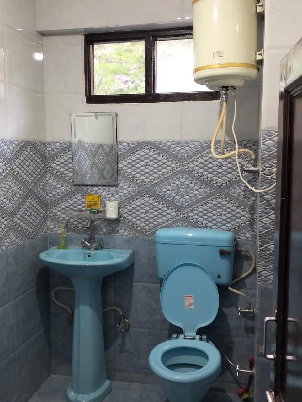Aman Inn Dharamshala Buitenkant foto
